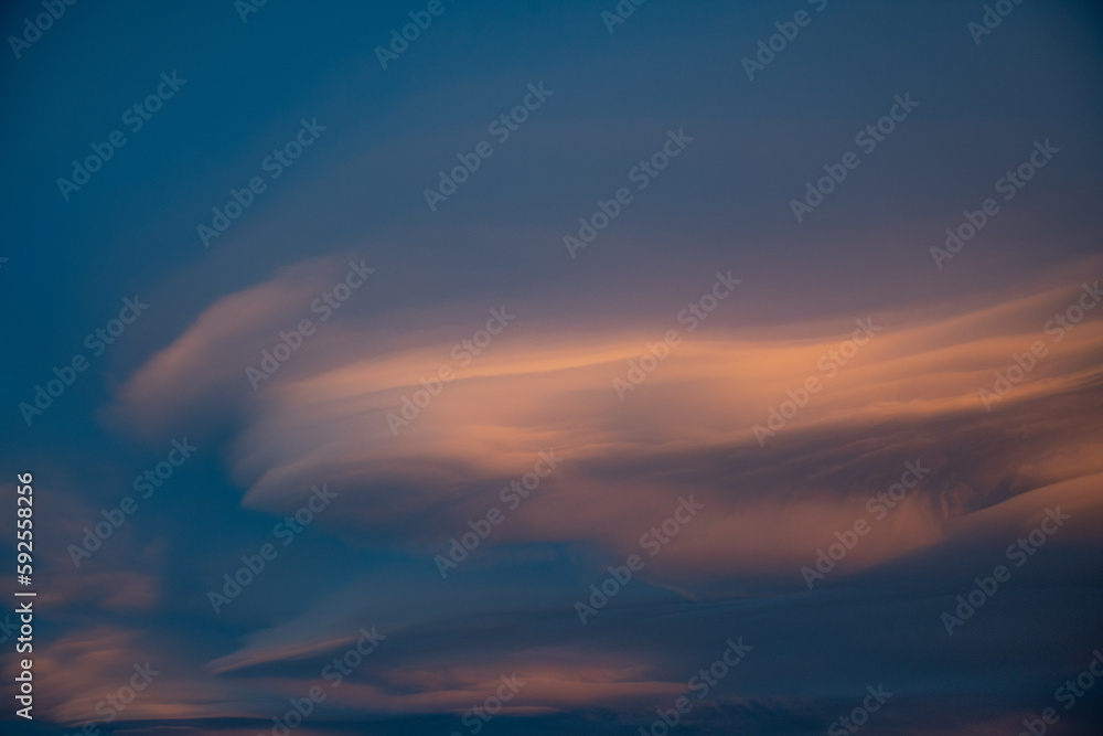 lenticular clouds over the swiss alps in zermatt during sunset