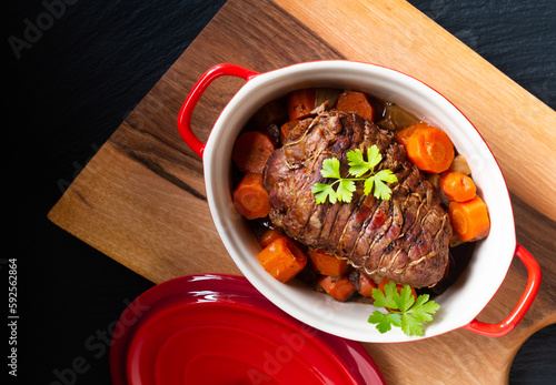Food concept homemade organic Veal Pot Roast Braised on black background with copy space