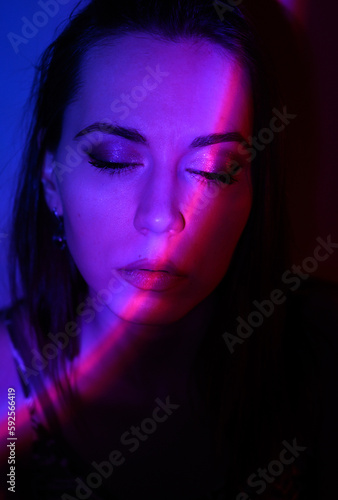 Abstract portrait of a woman with colored light.