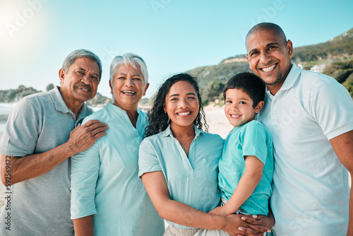 Family, happy and portrait outdoor with a child, parents and grandparents with a smile, love and care. Men, women and boy kid on vacation or holiday in summer for quality time and travel adventure