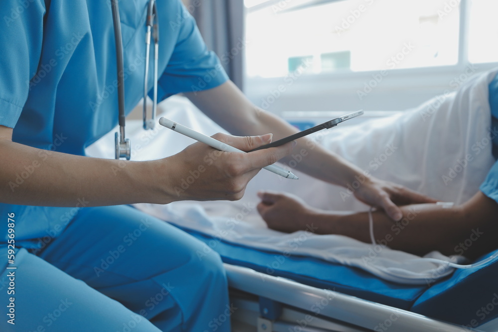 Injured patient showing doctor broken wrist and arm with bandage in hospital office or emergency room. Sprain, stress fracture or repetitive strain injury in hand. Nurse helping customer. First aid. Injured patient showing doctor broken wrist and arm with bandage in hospital office or emergency room. Sprain, stress fracture or repetitive strain injury in hand. Nurse helping customer. First aid.