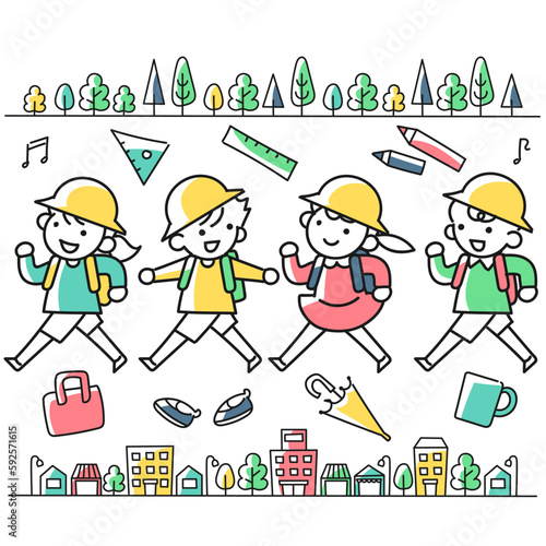 登校する小学生の女の子と男の子と街並み