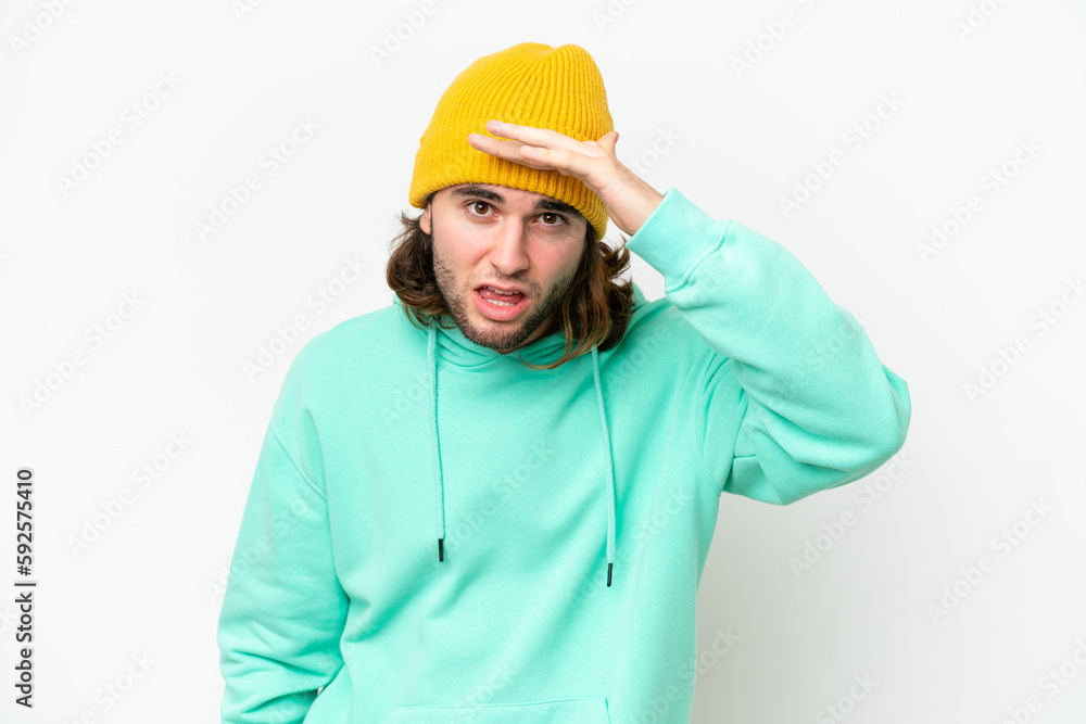 Young handsome man isolated on white chroma background looking far away with hand to look something Young handsome man isolated on white chroma background looking far away with hand to look something