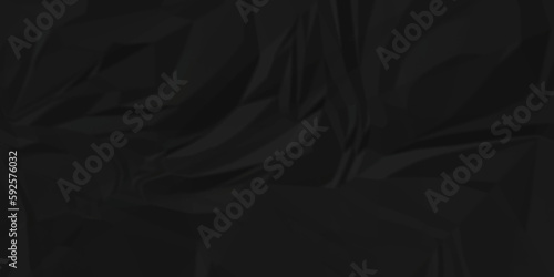 Black fabric texture and Crumpled black paper. Textured crumpled black paper background. 