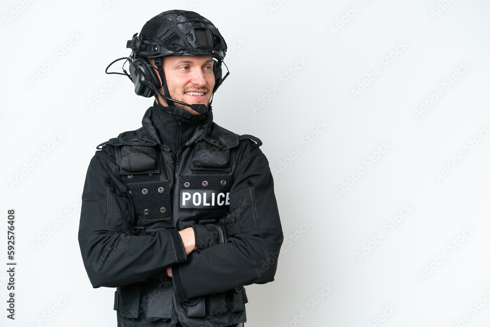 SWAT man over isolated white background with arms crossed and happy SWAT man over isolated white background with arms crossed and happy