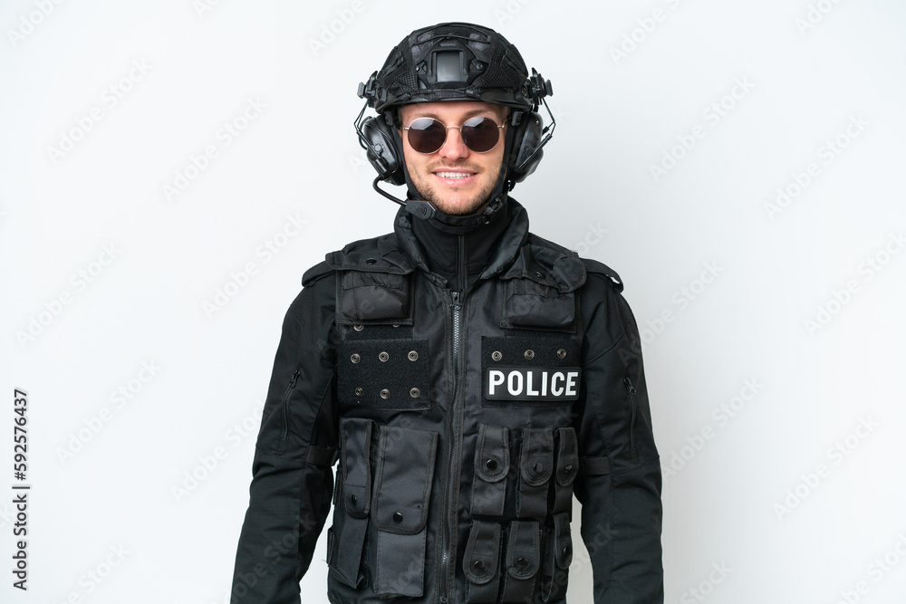 SWAT man over isolated white background with glasses and happy SWAT man over isolated white background with glasses and happy