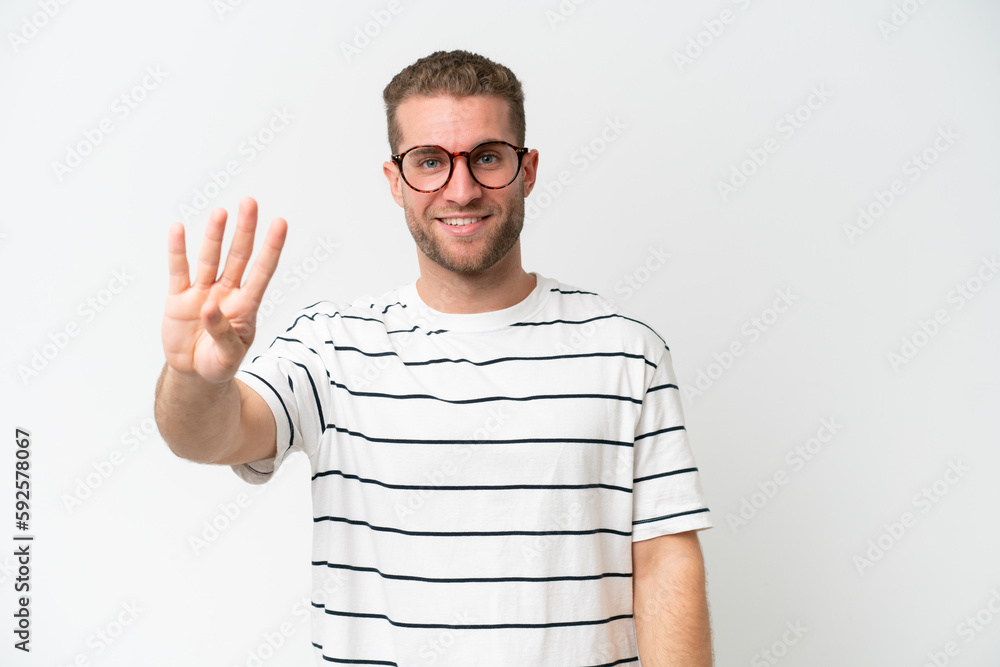 Young handsome caucasian man isolated on white background happy and counting four with fingers Young handsome caucasian man isolated on white background happy and counting four with fingers