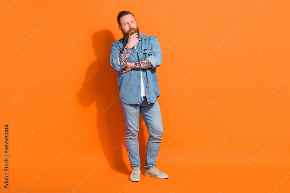 Hmm interesting question. Photo of worker guy thinking look empty space isolated shine color background Hmm interesting question. Photo of worker guy thinking look empty space isolated shine color background