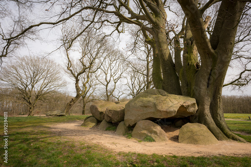 Early spring landscape with a pair of Neolithic tombs or dolmen (known as D21 and D22) in the rural province of Drenthe, The Netherlands.