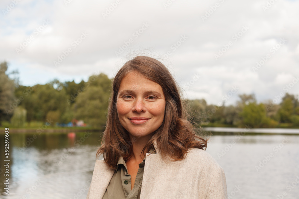 Outdoor portrait of cute happy woman Outdoor portrait of cute happy woman