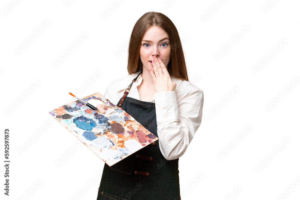 Young artist woman holding a palette over isolated chroma key background happy and smiling covering mouth with hand Young artist woman holding a palette over isolated chroma key background happy and smiling covering mouth with hand