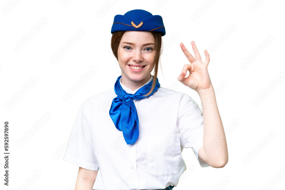 Airplane stewardess over isolated chroma key background showing ok sign with fingers Airplane stewardess over isolated chroma key background showing ok sign with fingers