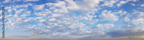 Panorama view of morning sky with fluffy white clouds