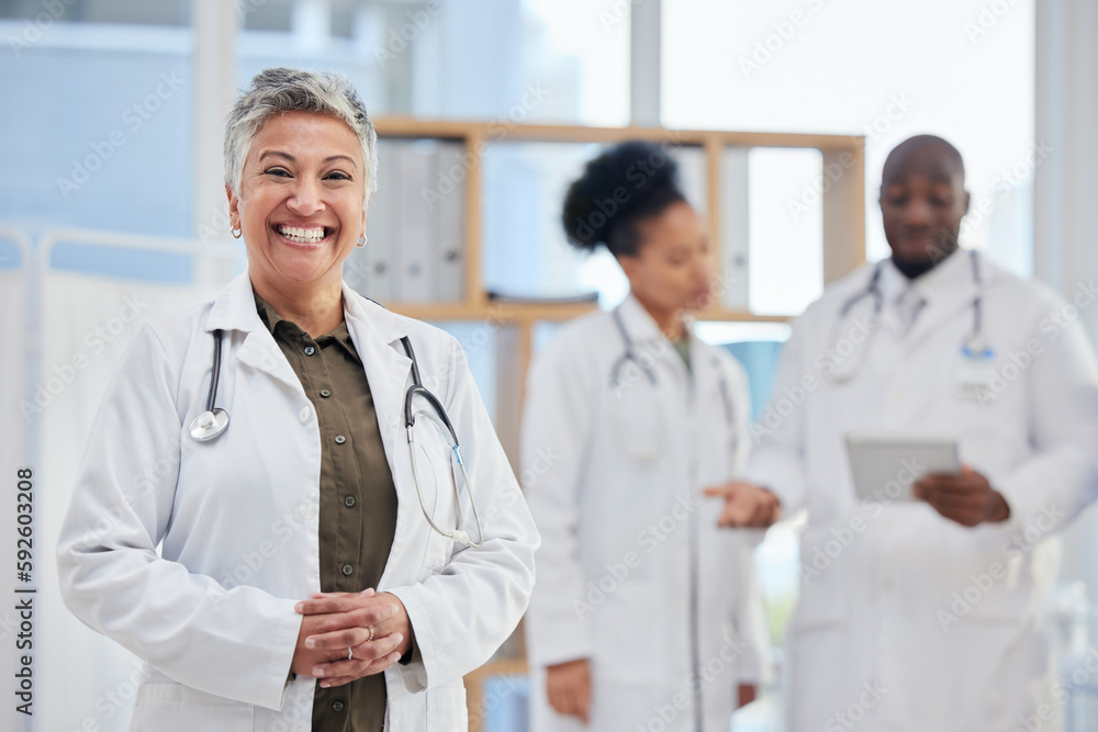 Fototapeta premium Hospital, doctor and portrait of senior woman in healthcare clinic for insurance, wellness and medical service. Medicine, leadership and female health worker smile for professional care and help