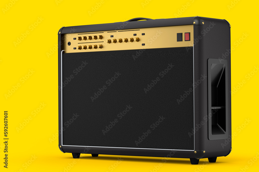 Classical electric and acoustic guitar amplifier isolated on yellow background.