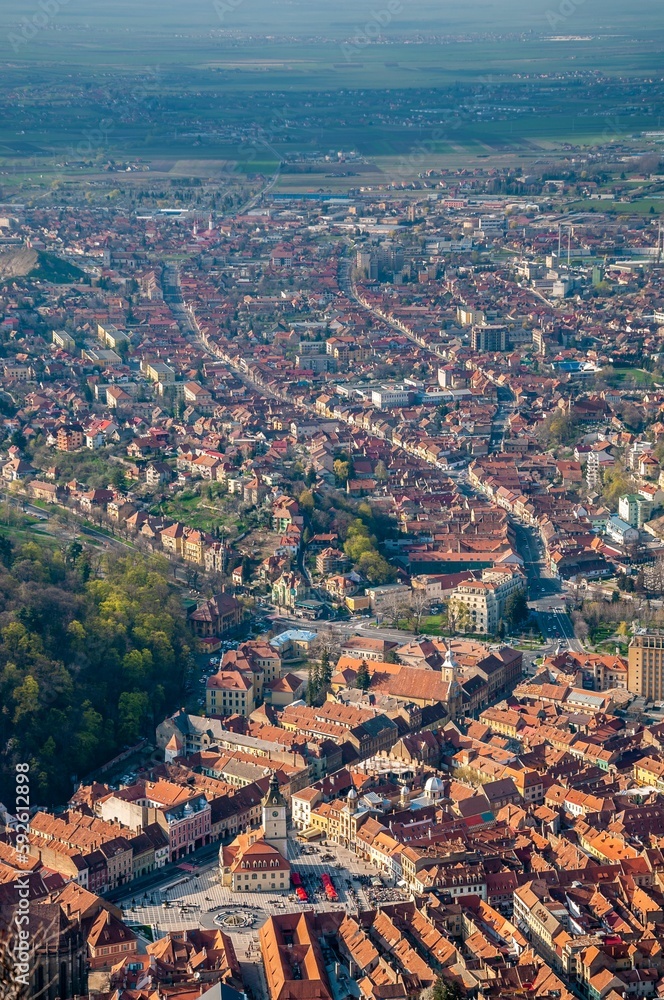 Aerial view of the city of Brasov on a sunny day in Transylvania region, Romania