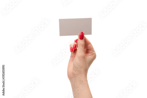 Empty card in woman hand with red nails isolated on a white background.