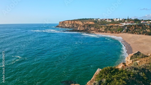 Beautiful coastline seascape in Europe. Beautiful rocky seascape with rolling waves to the shore. Aerial view: beautiful nature landscape. Drone view of scenic nature in Portugal.