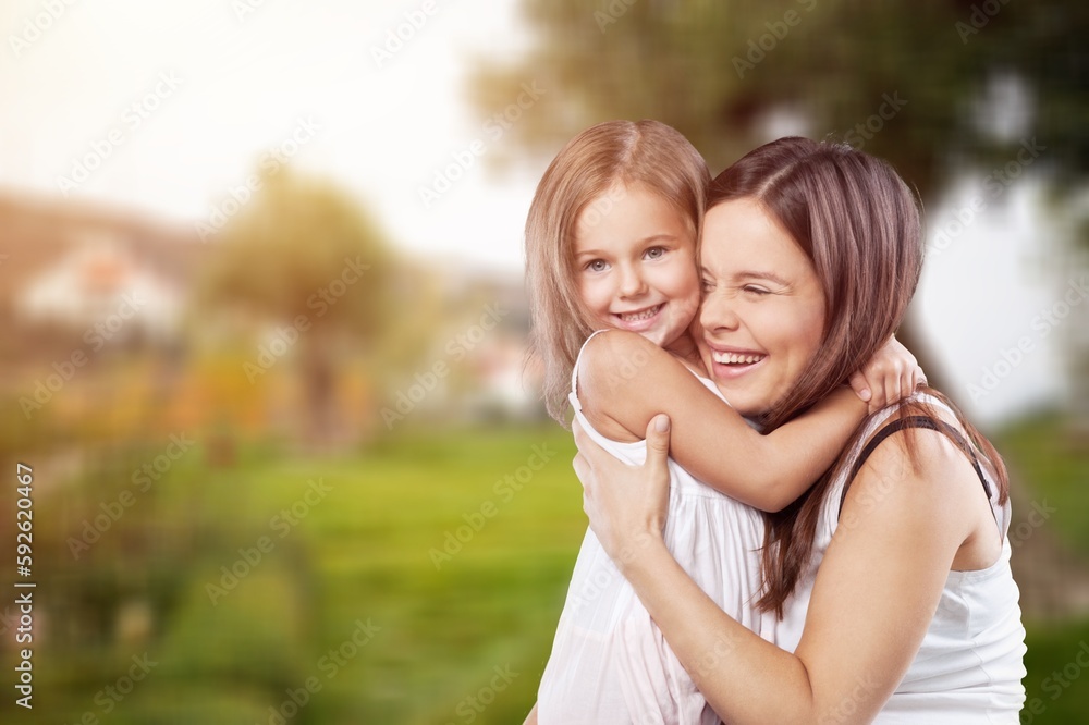 Happy young Parent and cute child with a smile Happy young Parent and cute child with a smile