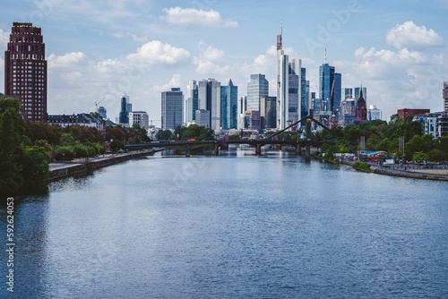 River with the Frankfurt city skyline in the background on a sunny day