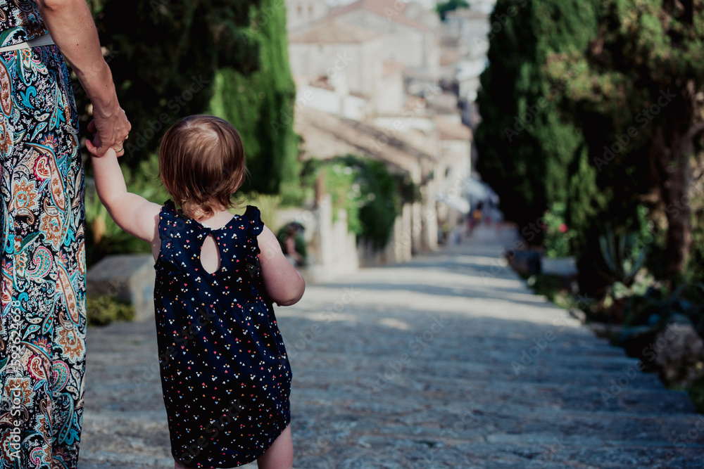 The little girl in the old ancient town. The little girl in the old ancient town.
