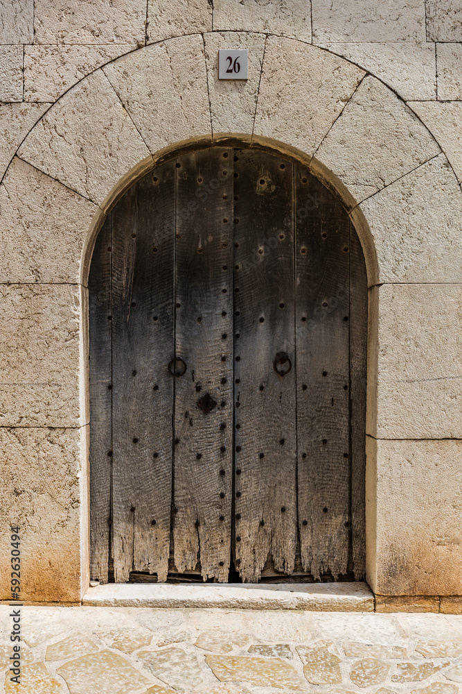 old wooden door in wall