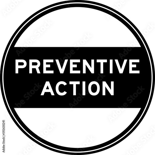 Black color round seal sticker in word preventive action on white background
