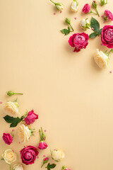 Mother's Day affection concept. Top vertical view of lovely roses on pastel beige background with copy space
