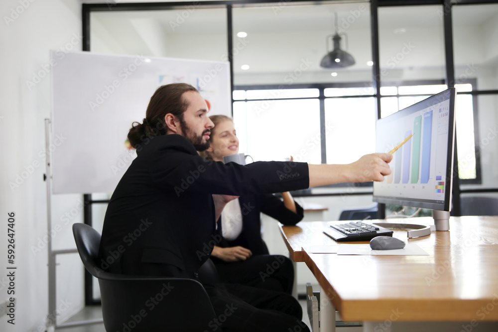 Business discussions. Shot of business people discussing and brainstorming in an office Business discussions. Shot of business people discussing and brainstorming in an office