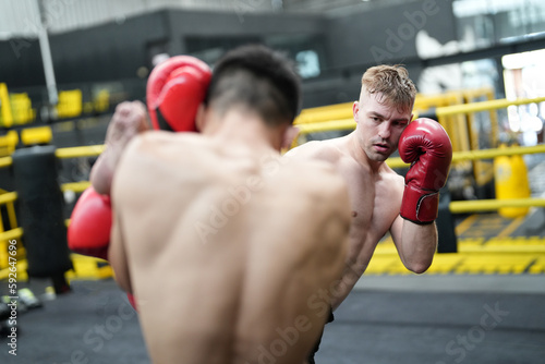 Two professional boxers fighting at the gym © FotoArtist