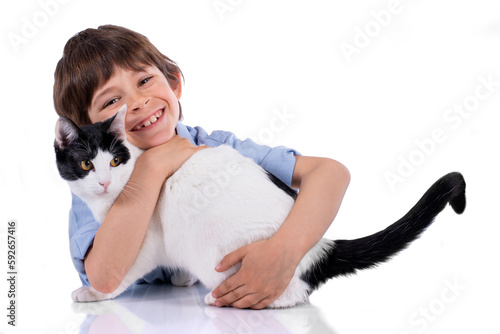 Принти на полотні Smiling boy hugs his domestic cat isolated on white