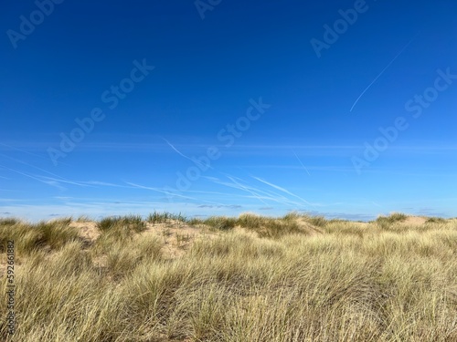 Seaside view with golden sand beaches and landmarks. Taken in Lytham Lancashire England.  photo