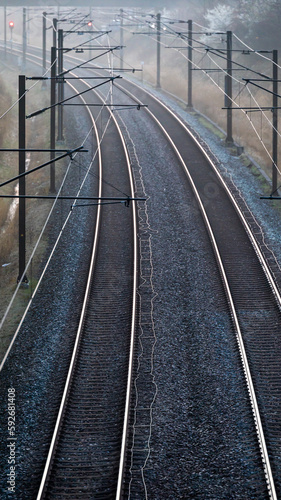 Photography Copenhagen, Denmark Commuter train tracks in the mist.