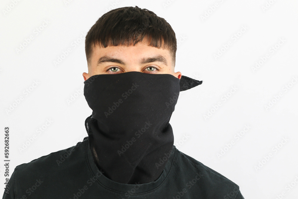Teenage boy black mask white background Teenage boy black mask white background