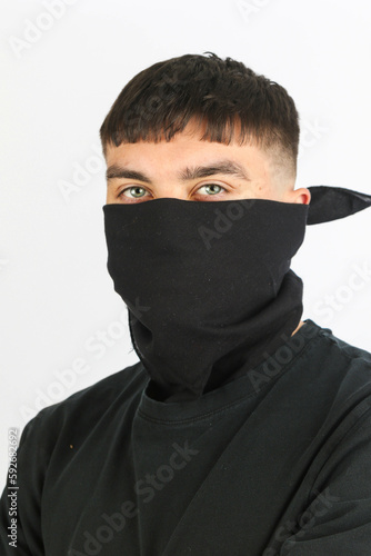 Teenage boy black mask white background