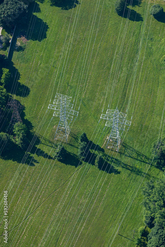 Hydro transmission towers in a green field.