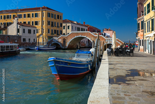 Canal Cannaregio and brigde Three Arches Bridge or Ponte dei Tre Archi in Venice, Italy