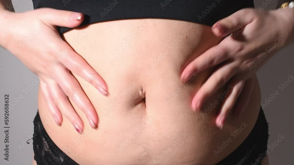 Women belly fat, postpartum belly front view video. Weight loss process Women belly fat, postpartum belly front view video. Weight loss process