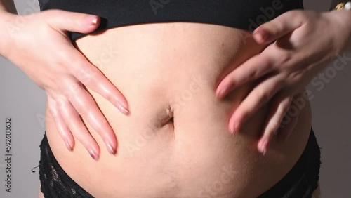 Wallpaper Mural Women belly fat, postpartum belly front view video. Weight loss process Torontodigital.ca