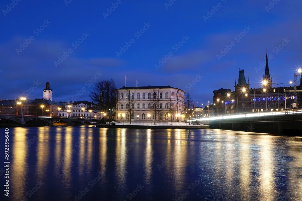 Beautiful panorama of illuminated Stockholm by night, waterfront view.  Sweden