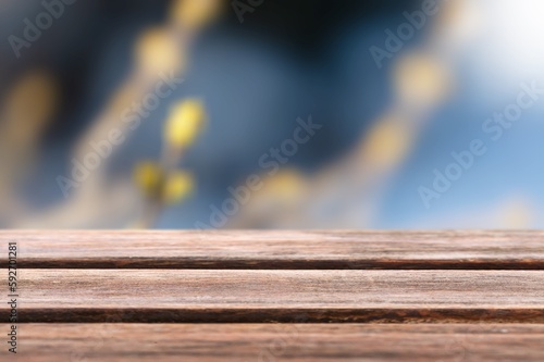 Rustic wooden texture desk on blur forest background