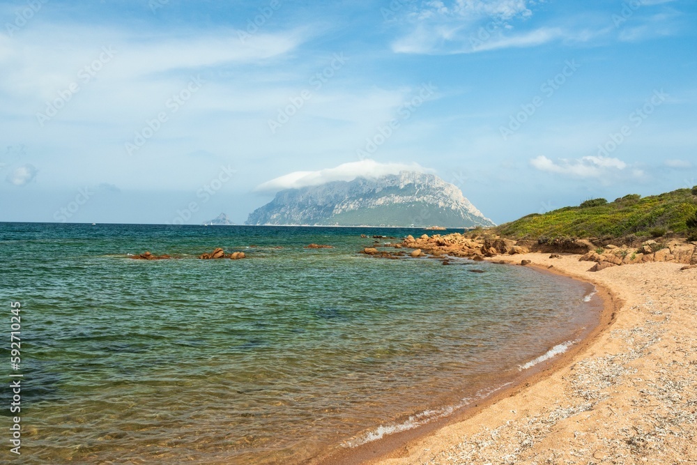 Fototapeta premium Landscape of the Sardinian sea surrounded by a beach near Porto Taverna, Italy