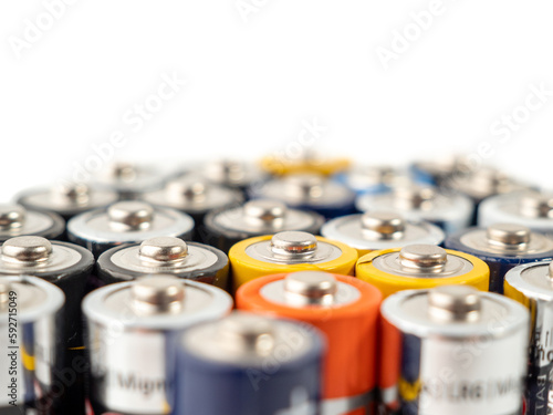 Batteries are alkaline. selective focus. The concept of energy sources and their use. Lots of AA batteries.