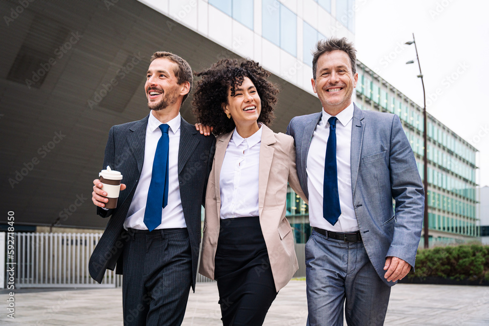 Multiethnic business people meeting in a business park - Multiracial group of corporate colleagues Multiethnic business people meeting in a business park - Multiracial group of corporate colleagues