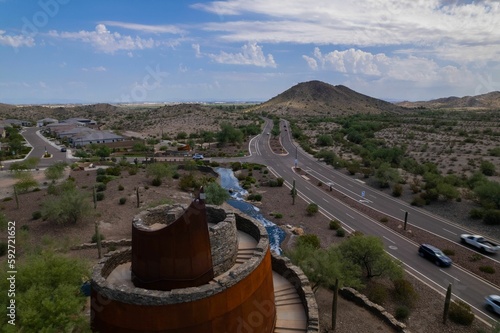 Aerial view of Estrella Star Tower by the highway in the countryside in Goodyear, Arizona
