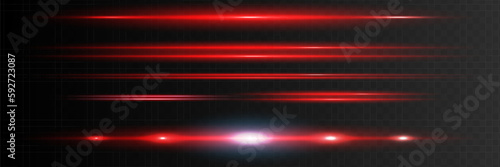 Red horizontal lens flares pack. Laser beams, horizontal light rays.Beautiful light flares. Glowing streaks on dark background. Luminous abstract sparkling lined background