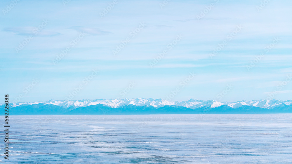 Winter landscape with mountains and Lake Baikal in Siberia on a sunny day. Winter landscape with mountains and Lake Baikal in Siberia on a sunny day.
