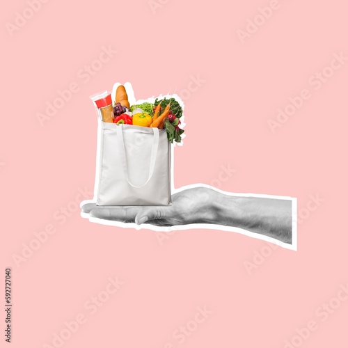 Contemporary collage of human hand holding small shopping bag