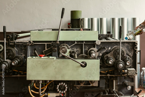 Close-up of a lithographic press or rolling press used for creating lithography, or a machine for drawing pictures using a stone.