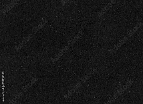 Texture of black paper with dust, hairs and bumps